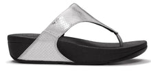 Load image into Gallery viewer, A single thong sandal shown in side profile against a plain white background. The upper strap features a textured metallic silver pattern, while the wedge heel, footbed, and toe post are black.
